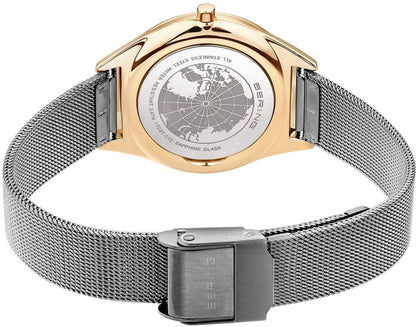 Damklocka: Boett med världskarta, silverfärgat mesh-armband, guldfärgat skydd