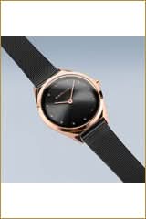 "Damklocka, sned vinkel: svart urtavla, roséguldpläterat hölje, svart metallarmband"
