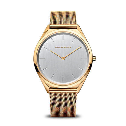 Goldfarbene Armbanduhr mit silbernem Zifferblatt und Milanaise-Armband