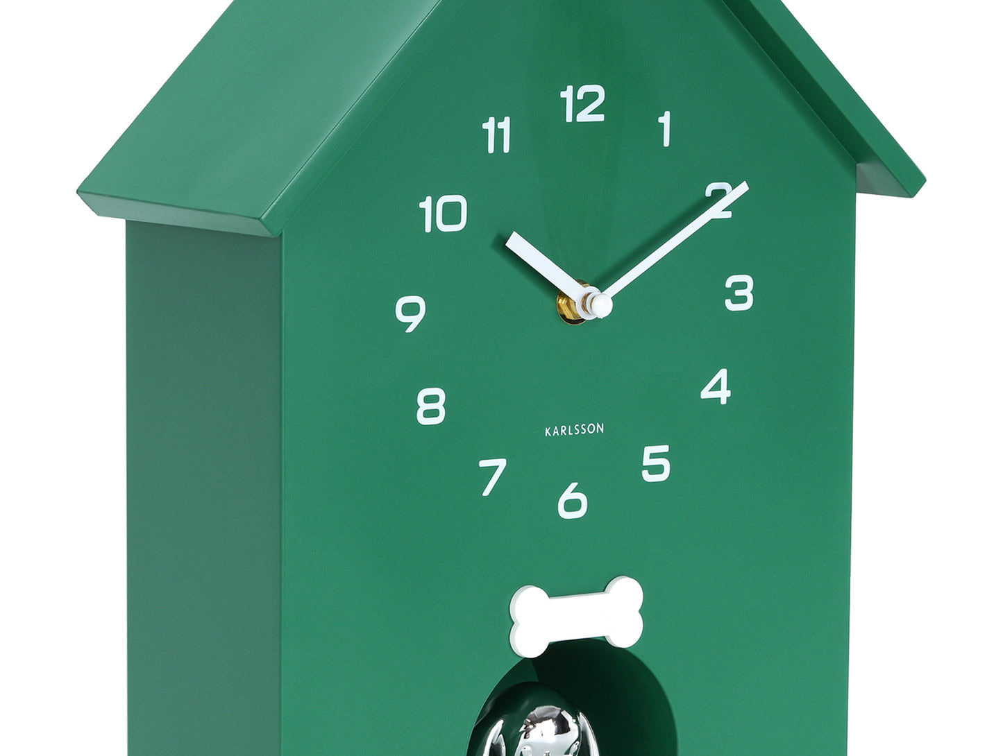 Grön väggklocka i hundkojedesign, detalj av visare och ben