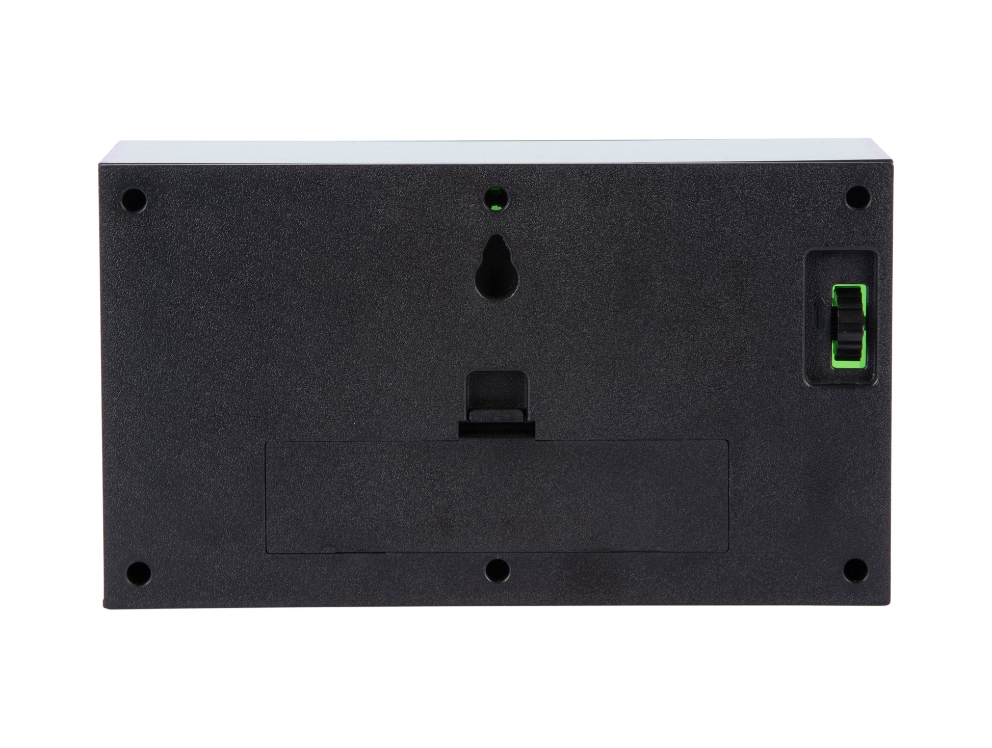 Baksida på bordsklocka: svart hölje med batterifack och display