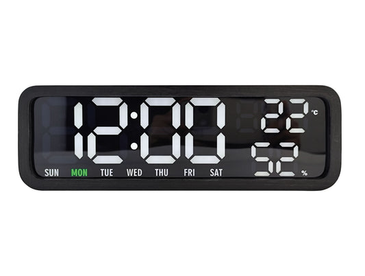 Digital väckarklocka med svart ram och stor digital display, veckodagsfält