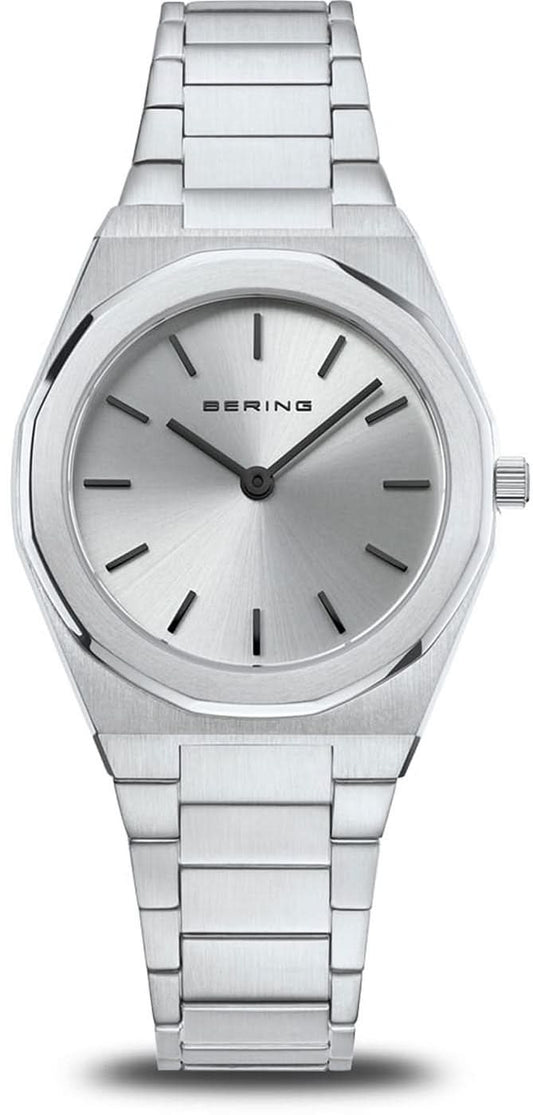 Bering damklocka med silverfärgat metallarmband, urtavla och indexmarkeringar