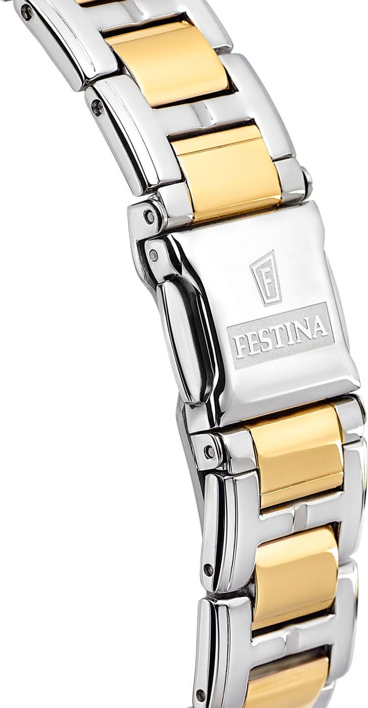 Damklocka i sidovy med tvåfärgat metallarmband och guldfärgade länkytor
