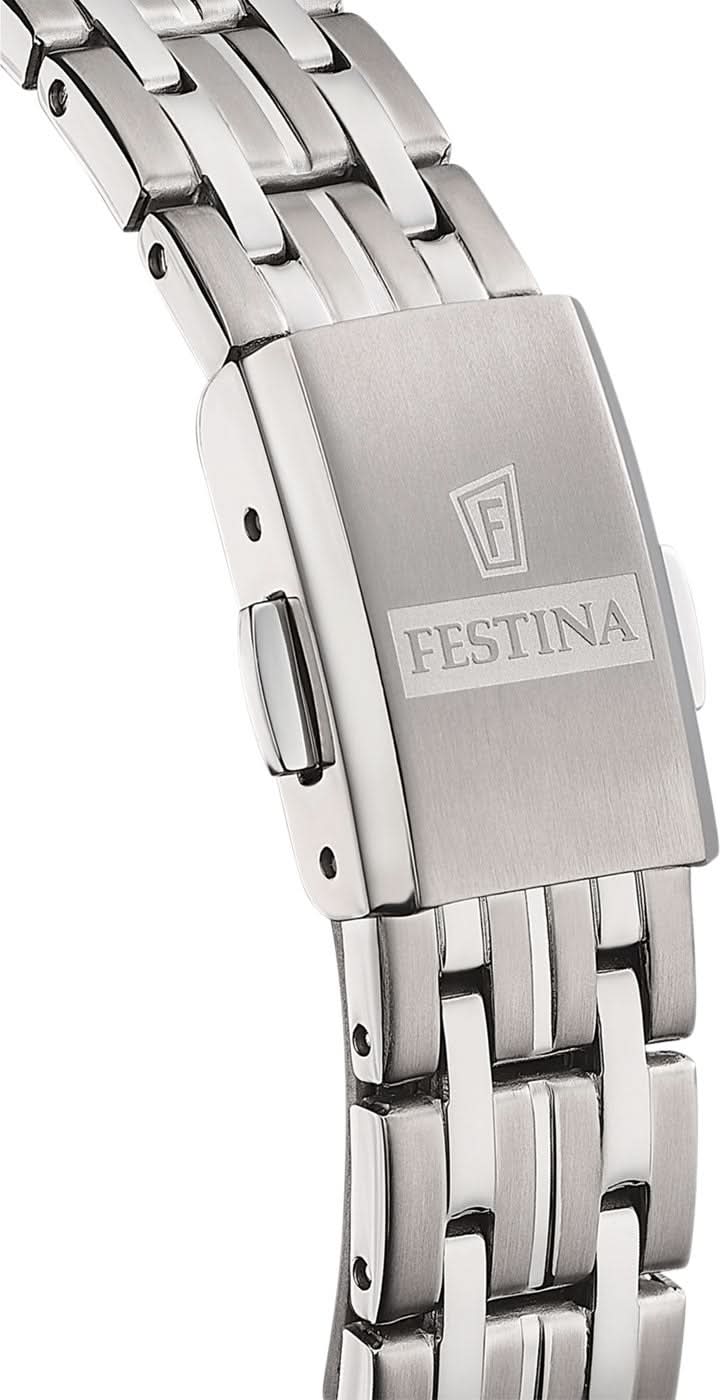 "Damklocka i titan, armbandslås med gravyr „FESTINA“."