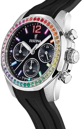 Festina damklocka: svart urtavla med kronograf-suburtavlor, färgad infattning, svart armband.