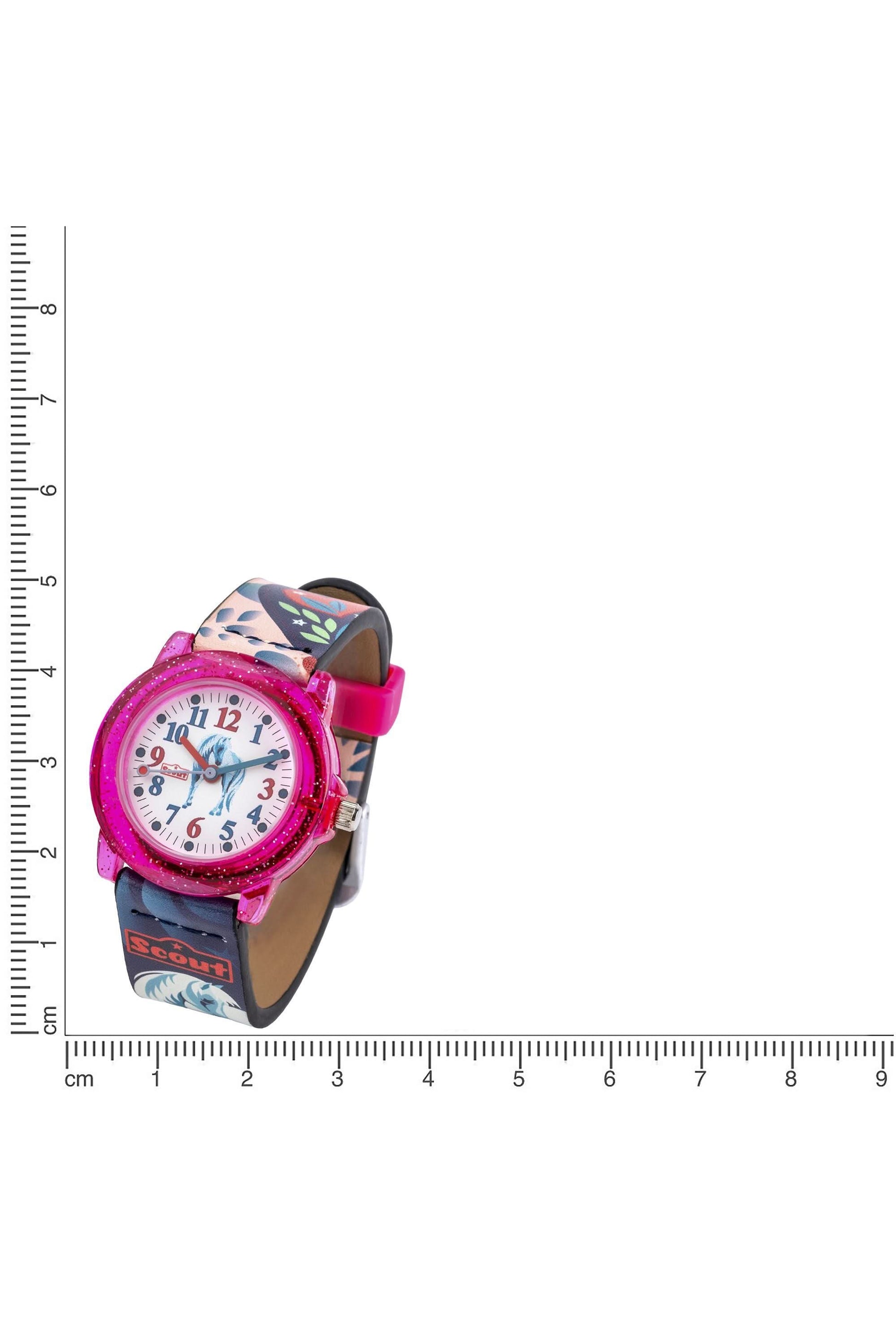 Flickur i miniformat med rosa glitterkant, vit urtavla och mörkblått armband