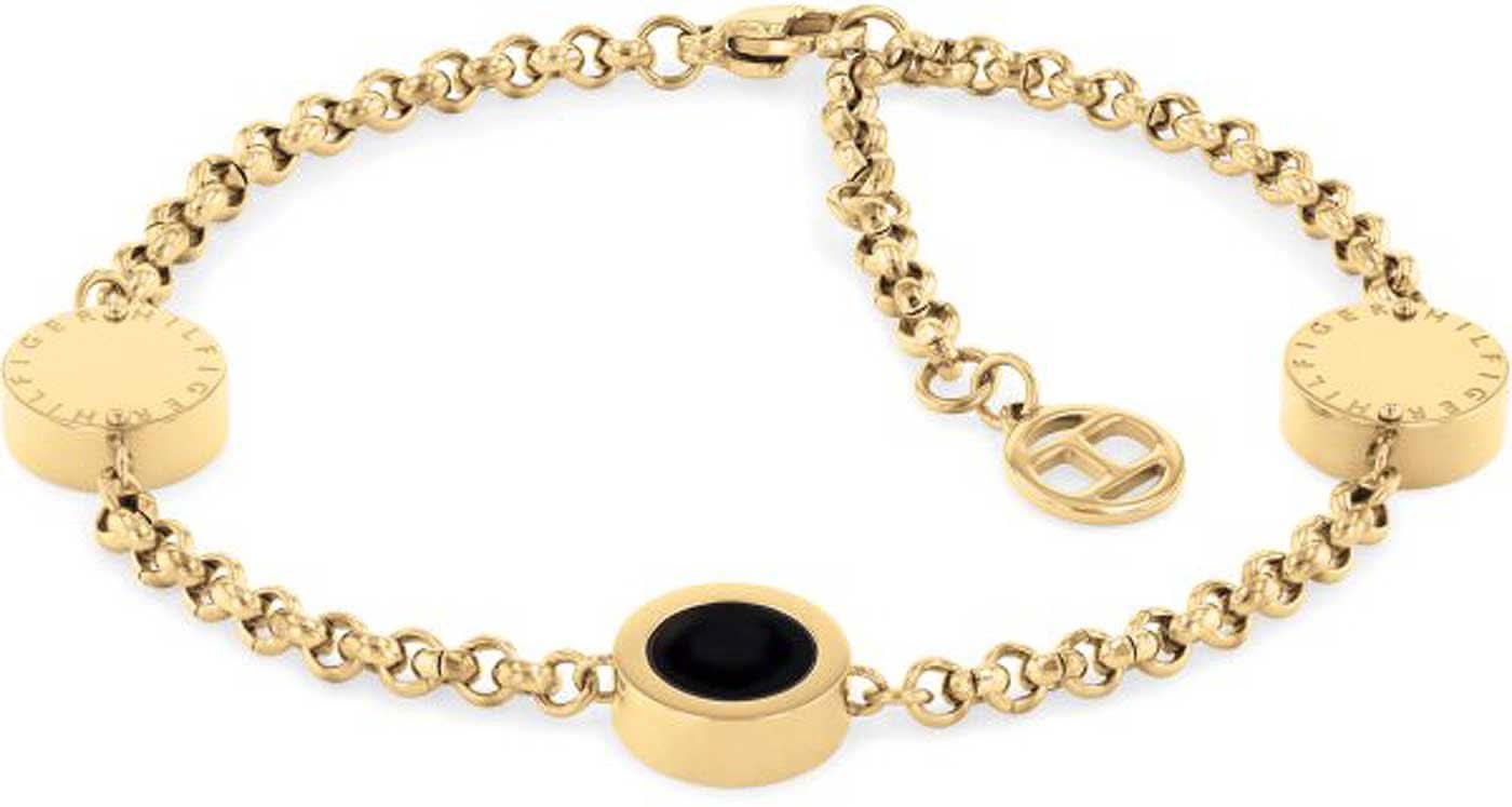 Armband med berlocker, guldfärgat band, runda skivberlocker och svart insats
