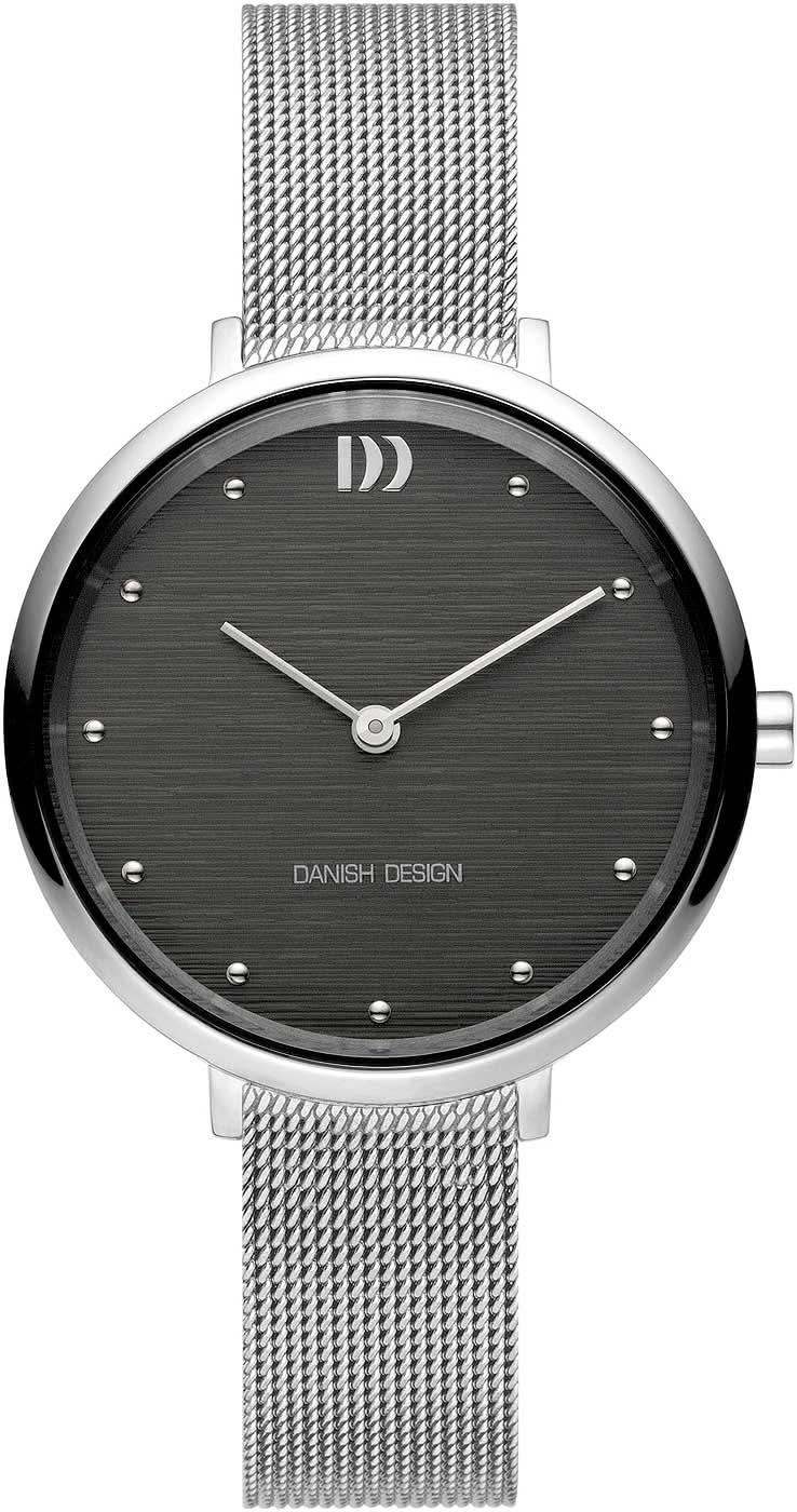 Dansk design damklocka med mörk urtavla, silverfärgat metallnätband och smal visaranvisning
