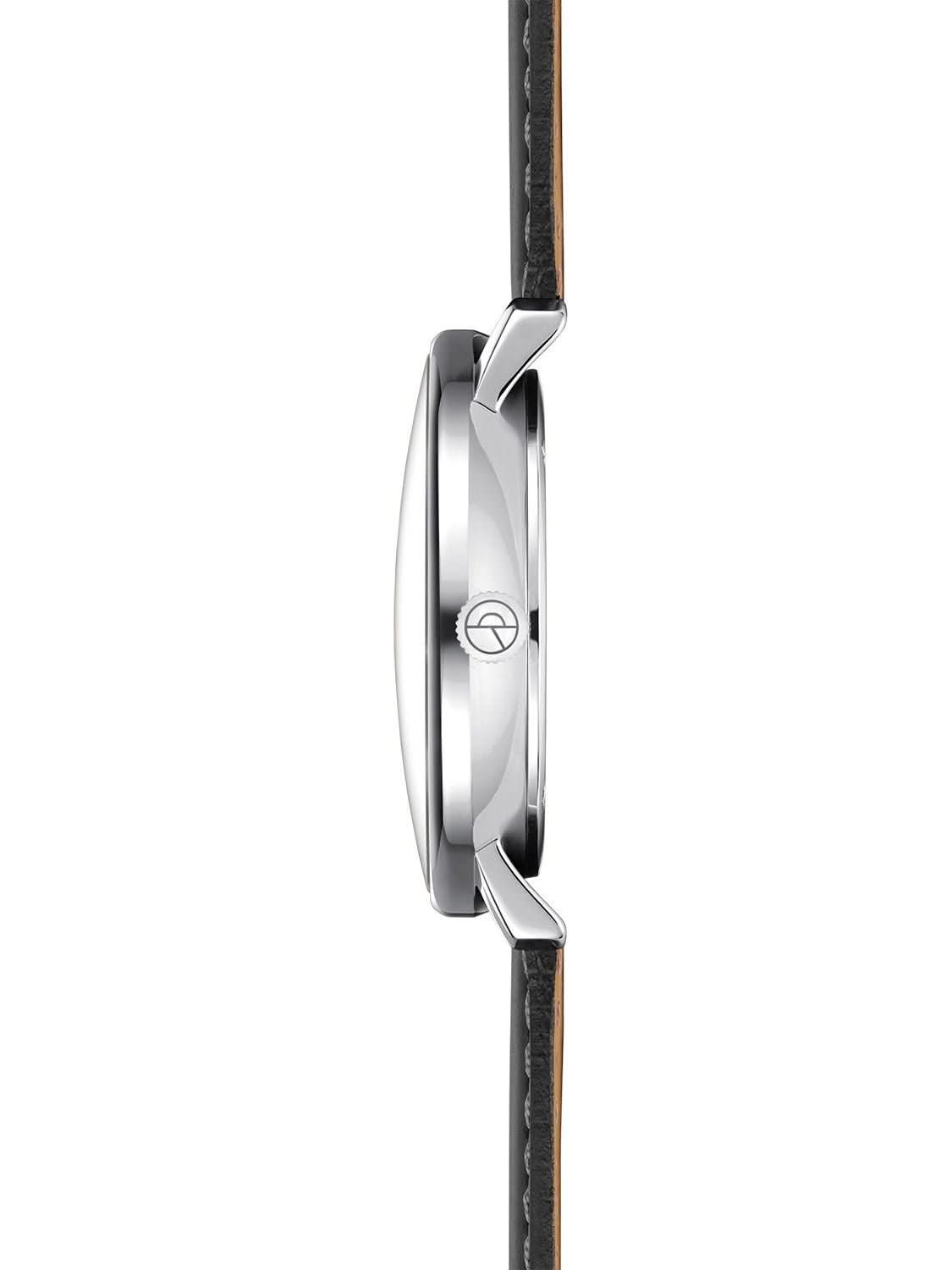 Armbandsur, sidovy med silverfärgat hölje och svart läderarmband