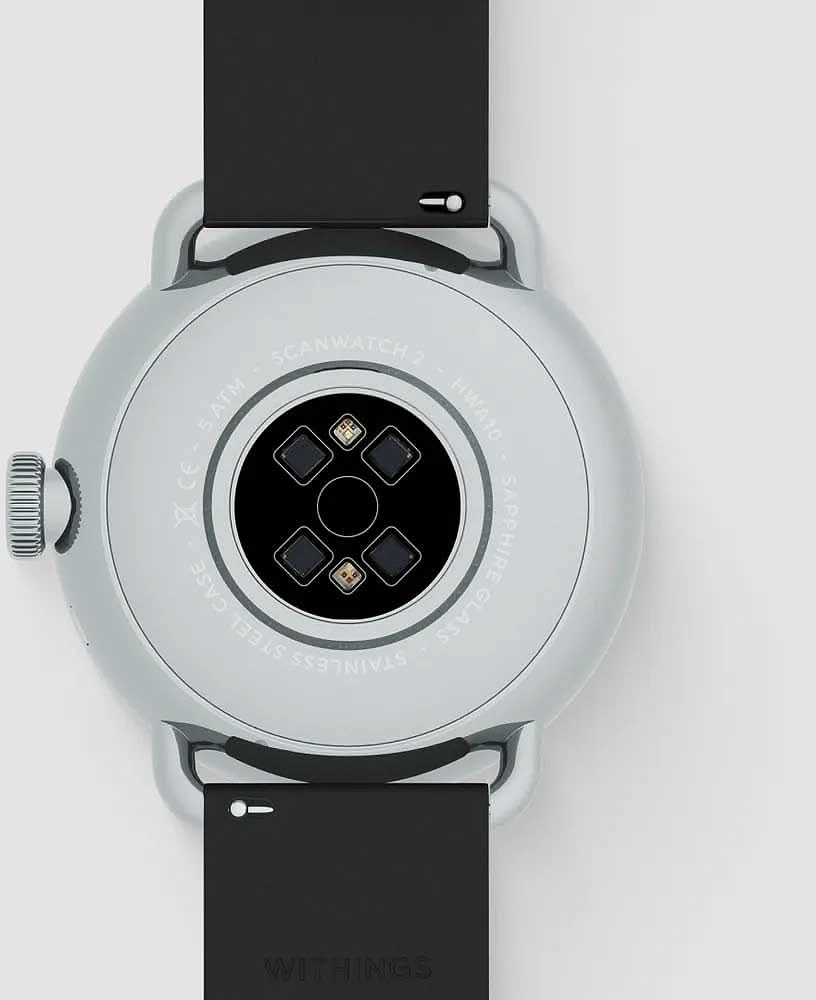 "Smartklocka baksida med sensorfält och svart armband"