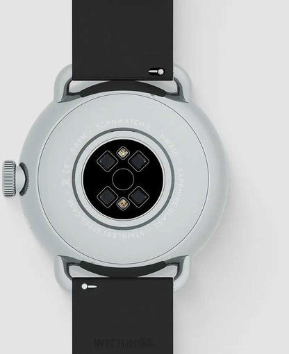 "Smartklocka baksida med sensorfält och svart armband"