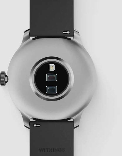 Smartwatch-baksida med sensorfält, svart armband och silverfärgat boett