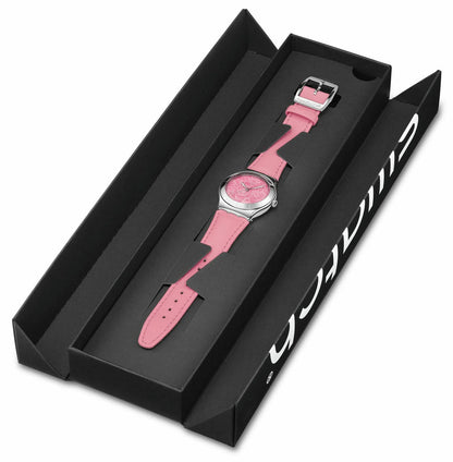 Swatch damklocka i öppen svart presentförpackning med rosa band.