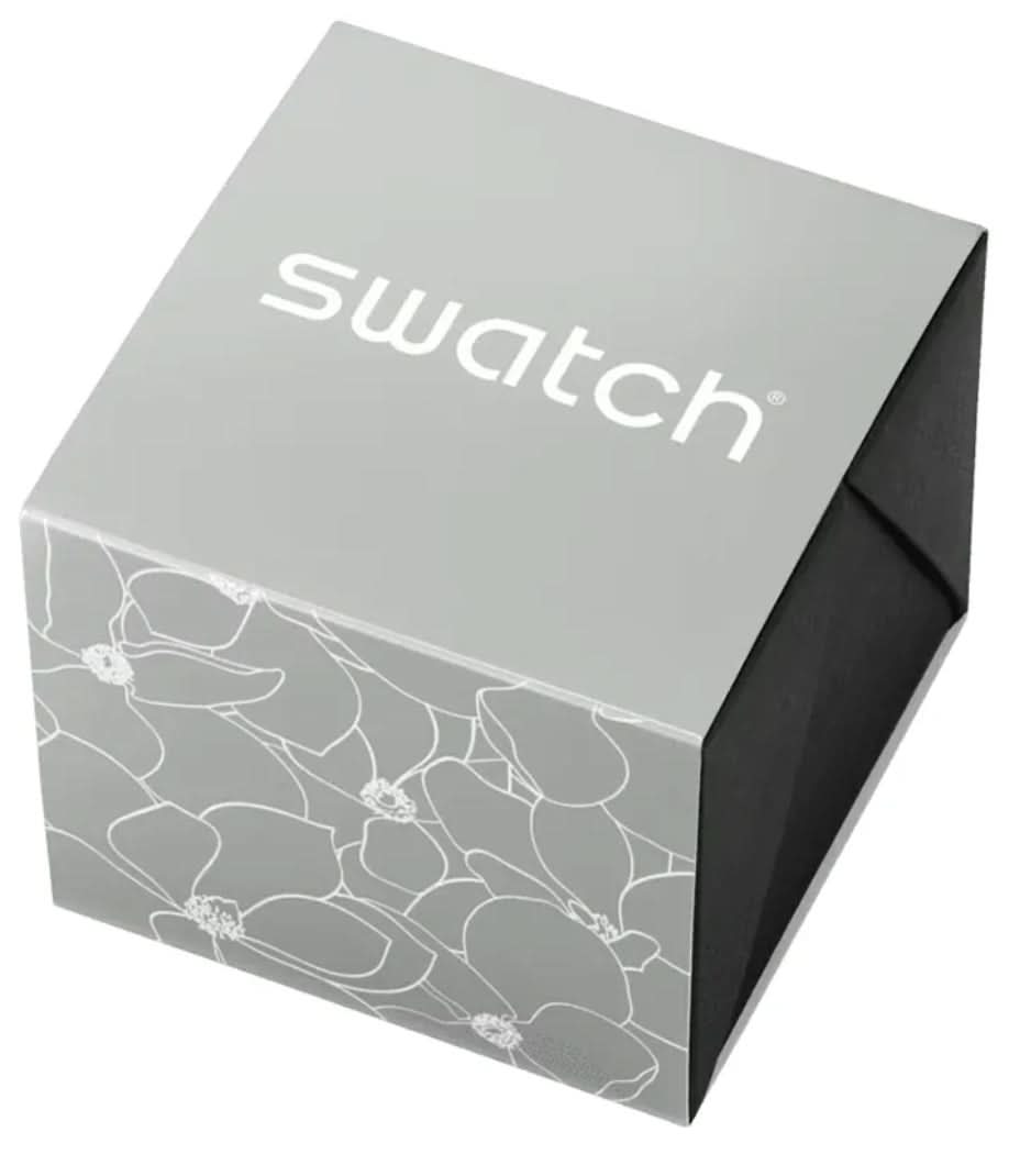 Swatch presentbox med vit swatch-logotyp och kortmönster på framsidan