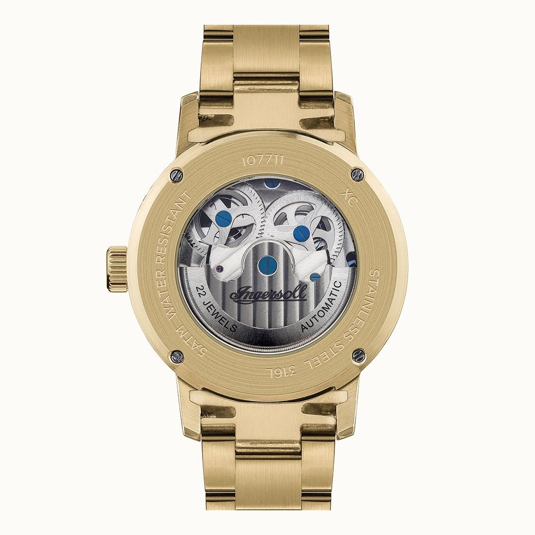 Rückseite einer goldfarbenen Herrenarmbanduhr mit Automatikwerk und Sichtfenster