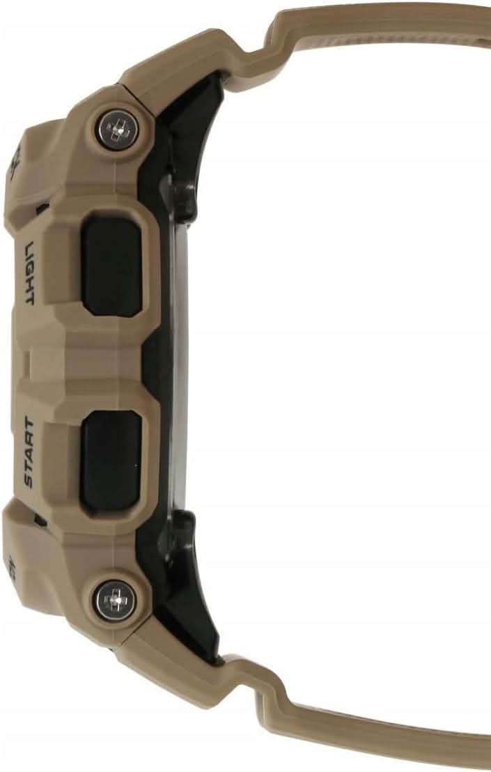 G-Shock herrklocka från sidan med beige boett, svarta reglage och plastarmband