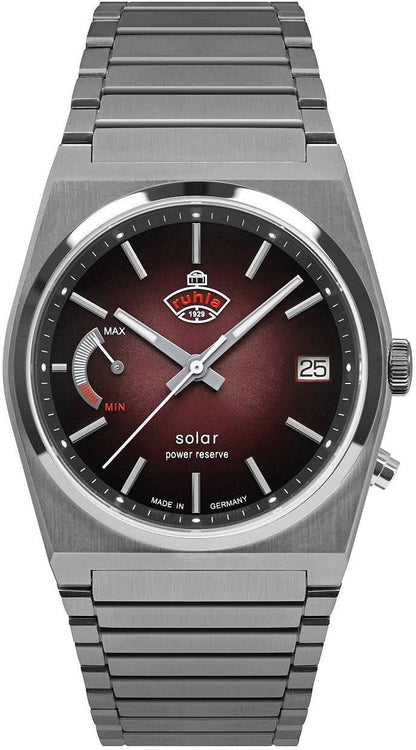 Herrklocka med metallarmband, mörk urtavla, sol-logotyp och datum 25