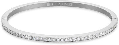 Armband i rostfritt stål med en rad prydnadsstenar längs kanten och Bering-logotyp.