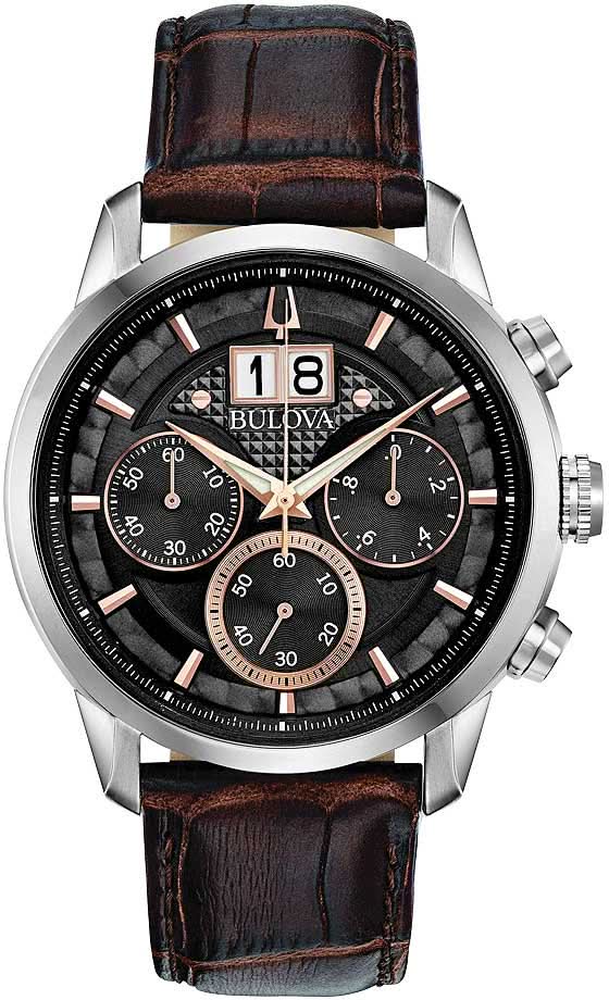Bulova herrklocka med brunt läderarmband, skeletterad urtavla och boett i silver