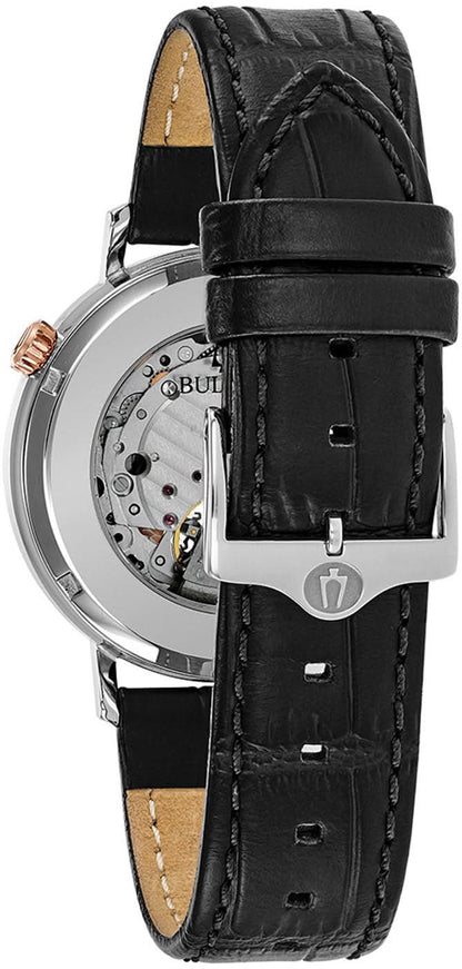 Herrklocka med svart läderarmband och öppen boett med synligt urverk