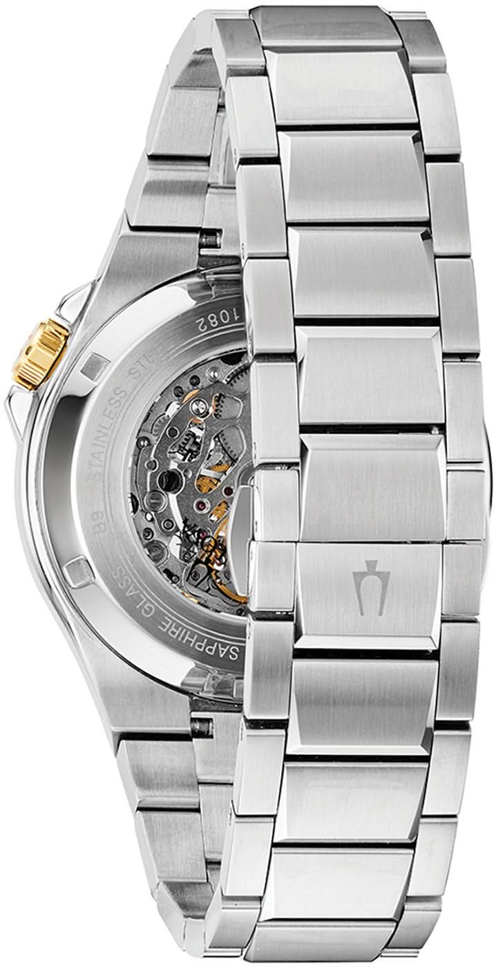 Bulova automatklocka, sidovy med synligt urverk genom boettens fönster