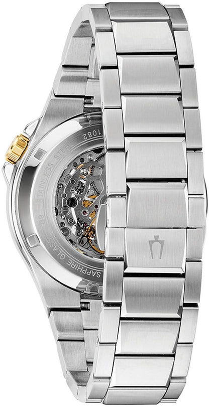 Bulova automatklocka, sidovy med synligt urverk genom boettens fönster