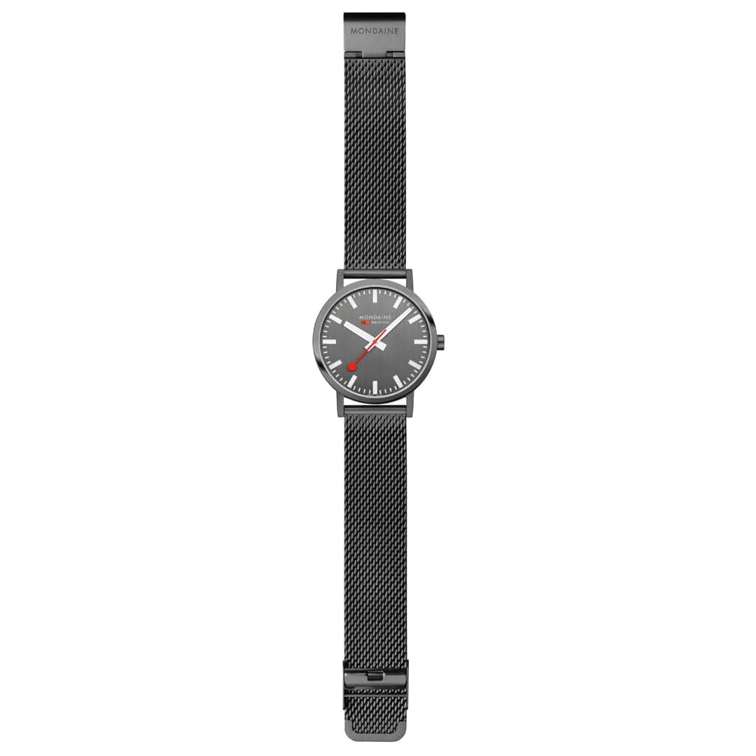 Mondaine herrklocka, rak vy: grå urtavla, röd visare, svart mesh-armband