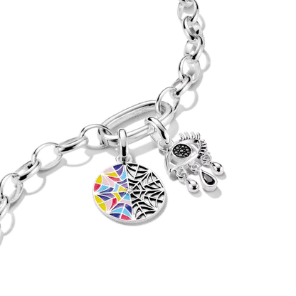 Berlock i silver till armband med ovalt, färgglatt motiv