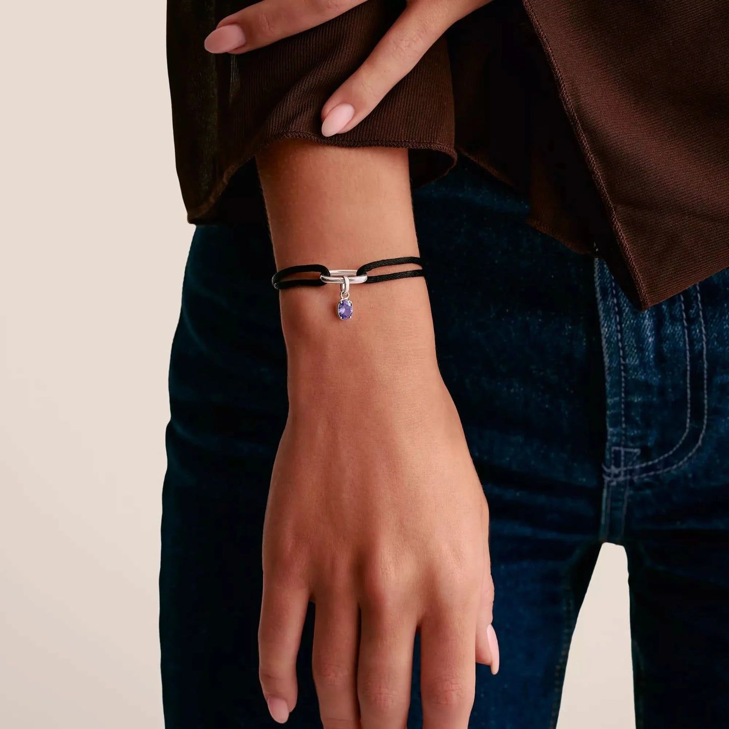 Armband med silverberlock och lila sten