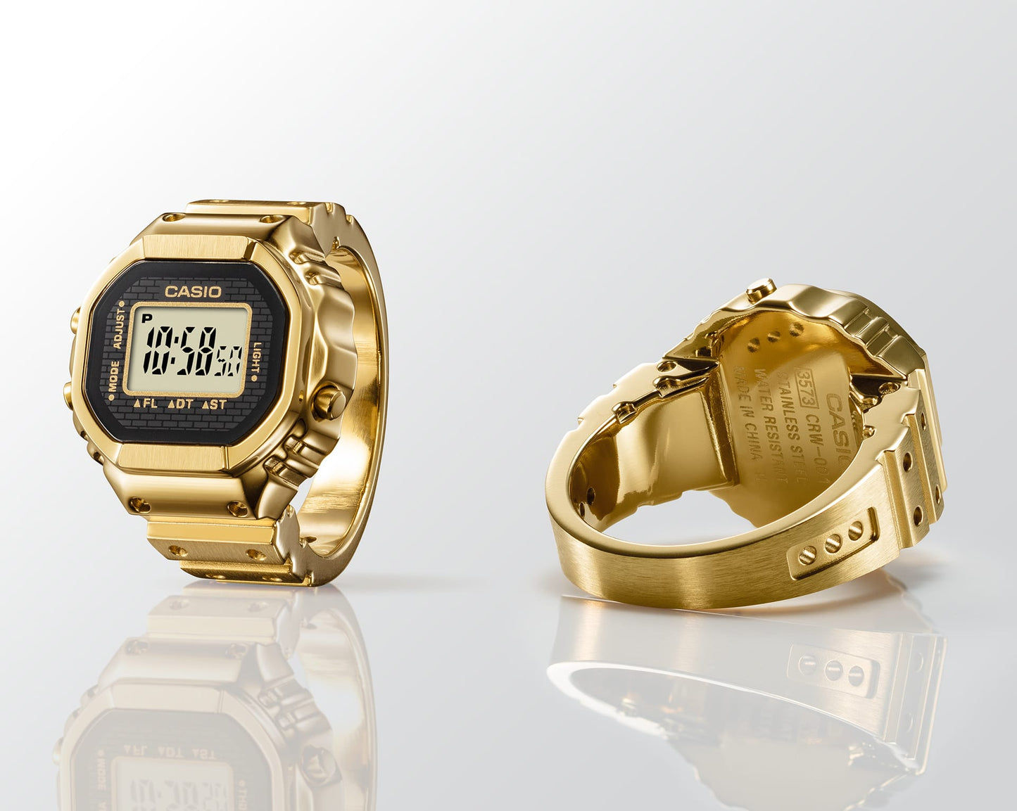 Casio Digitaluhr, goldfarbene Front und Rückseite, kantiges Gehäuse mit Armband