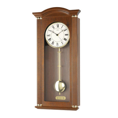 N Wall clock in walnut color with pendulum movement and round dial, Westminster chime