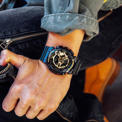 Casio G-Shock herrklocka med svart armband och guldfärgad urtavla