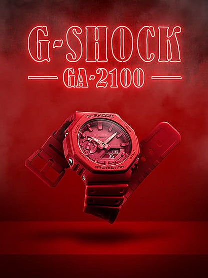 Röd herrklocka med G-SHOCK GA-2100-urtavla och skyddstext på boetten