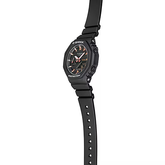 G-Shock damklocka på handleden: rund mörk urtavla med digital display i ramen