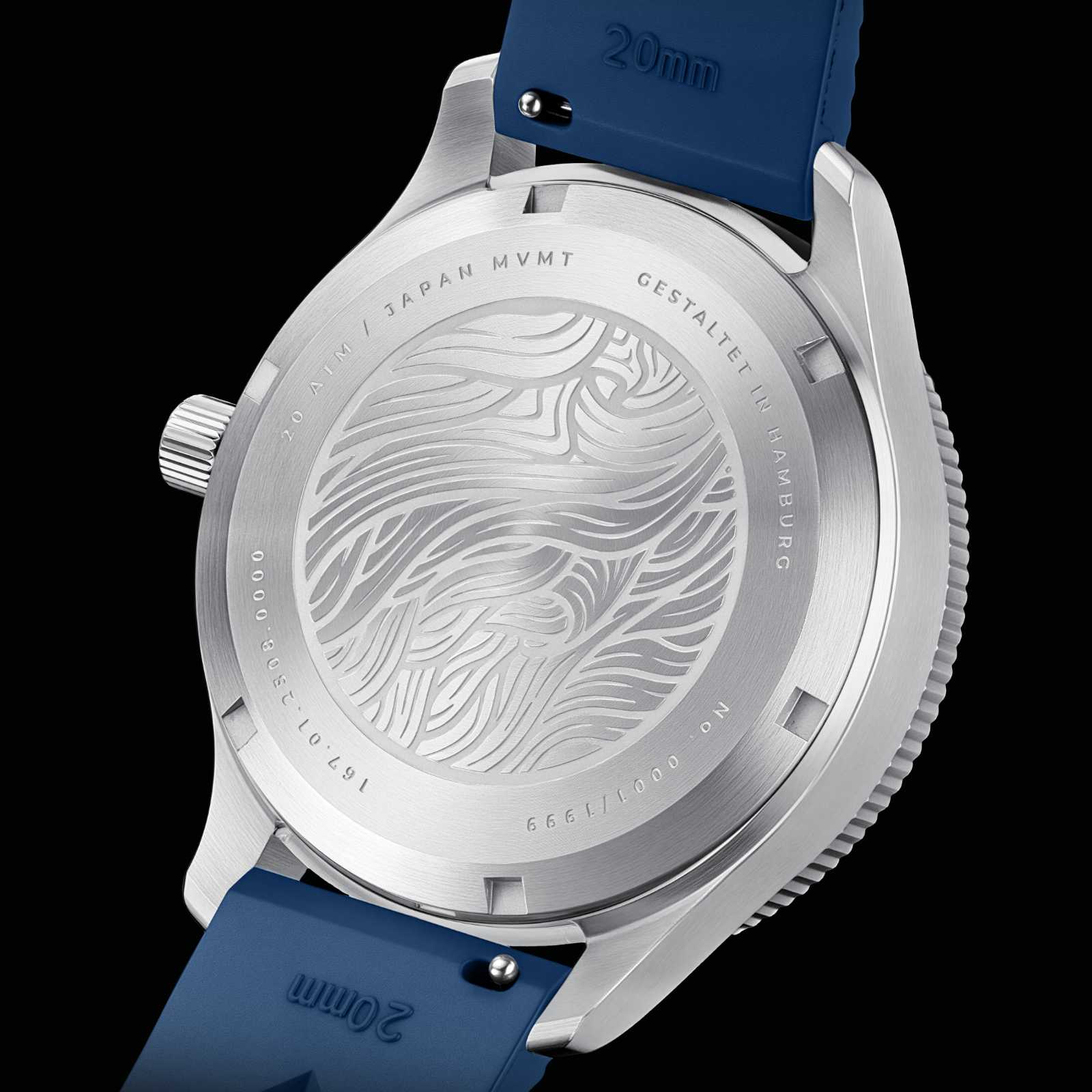 Herrarmbandsur, baksida: silverfärgat hölje med gravyr, blått armband.