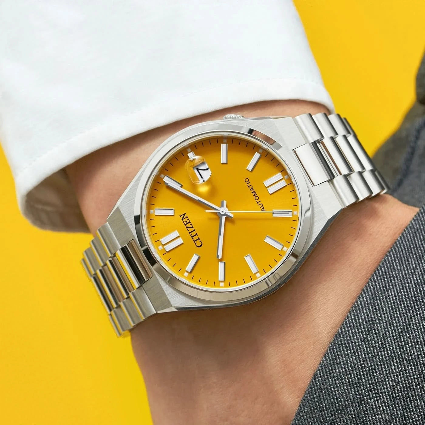 Citizen Tsuyosa automatisk klocka på handleden, gul urtavla, armband i rostfritt stål