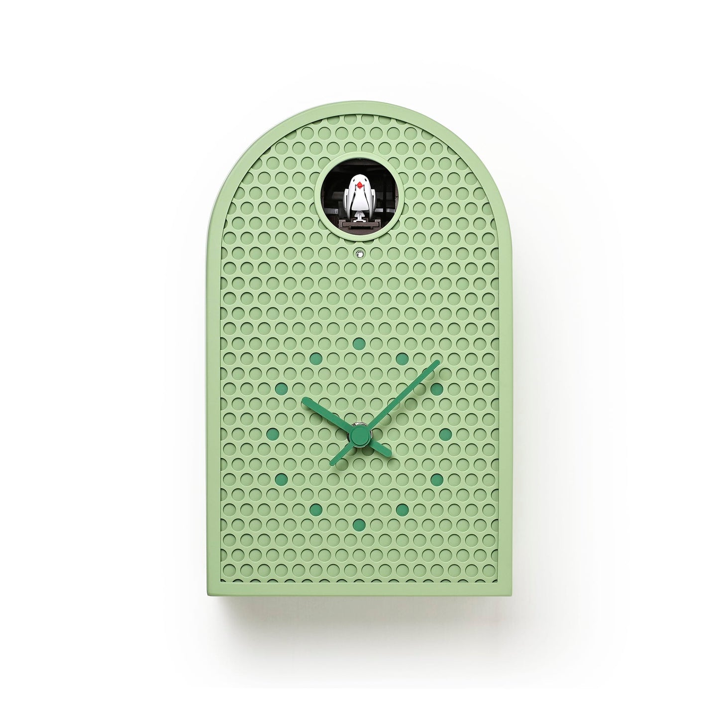 Grüne Wanduhr mit Relief-Punktemuster, Glasfenster mit Kuckuckfigur und grünen Zeigern.
