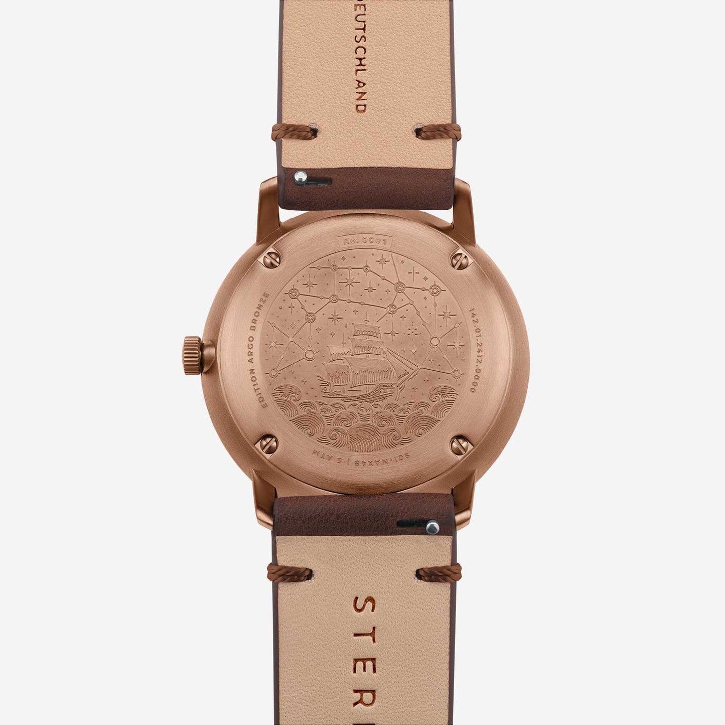 Herrklocka baksida: roséguldigt fodral med prägling, brunt läderarmband