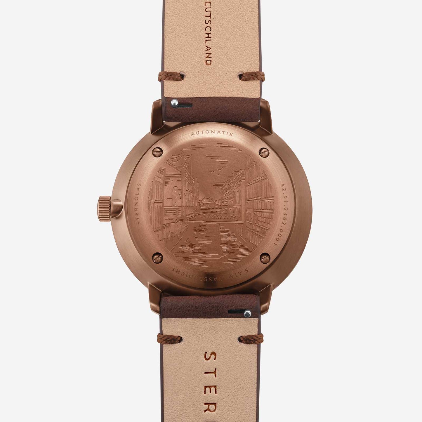 Herrklocka med roséguldpläterat hölje och beige läderarmband, präglad baksida.