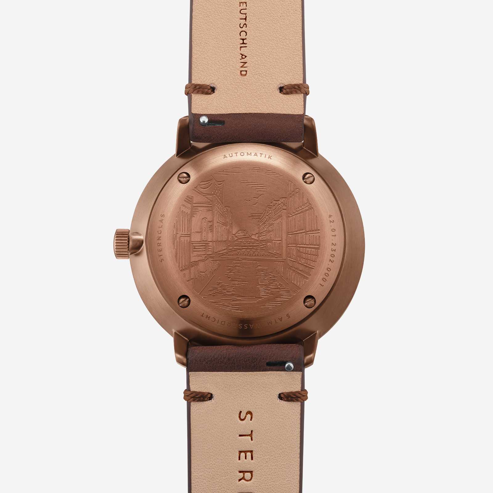 Herrklocka med roséguldpläterat hölje och beige läderarmband, präglad baksida.