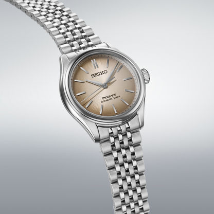Seiko Presage herrklocka, roséfärgad urtavla, armband i rostfritt stål, sned vy