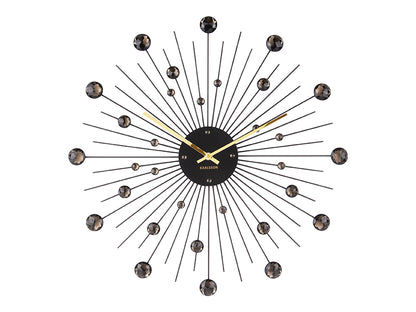 Stor väggklocka i sunburst-design med svarta kristallaccenter