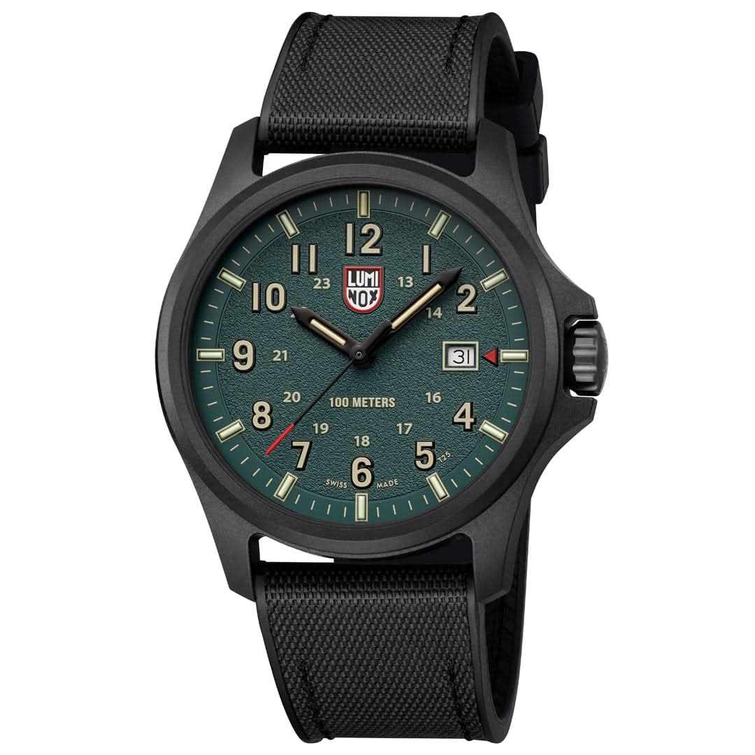 Luminox herrklocka med runt svart boett, blågrön urtavla, textilband