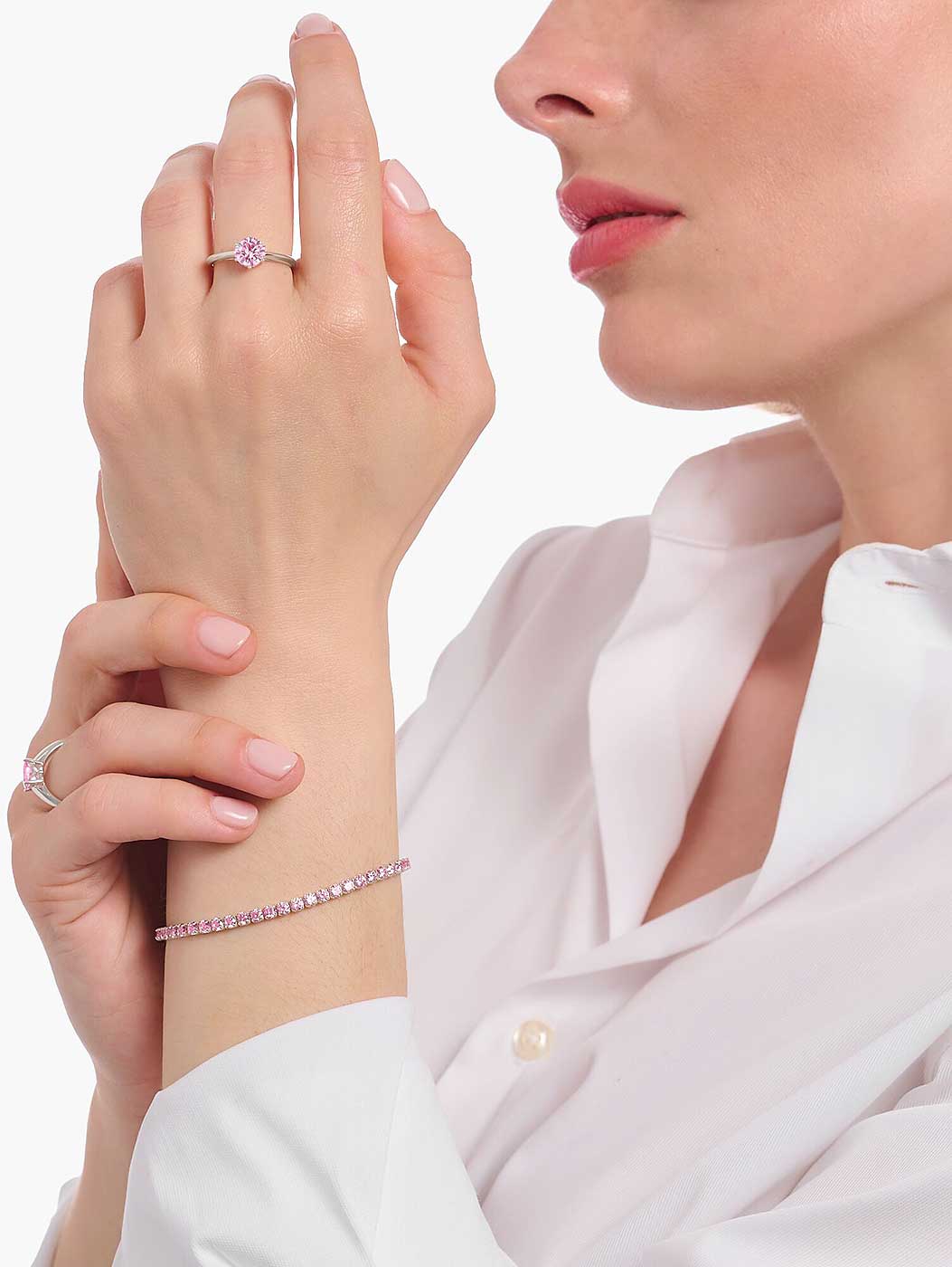 Tennisarmband med rosa zirkoniastenar och silverkedja