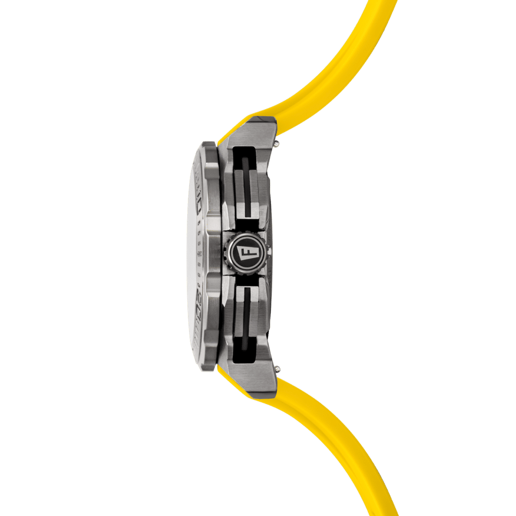Herrklocka, kronograf, sedd i profil, med gult silikonarmband och sidoknappar