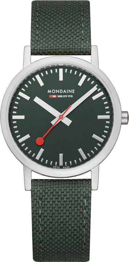 Unisex-armbandsur med mörkgrön urtavla, silverfärgat hölje och grönt textilband.