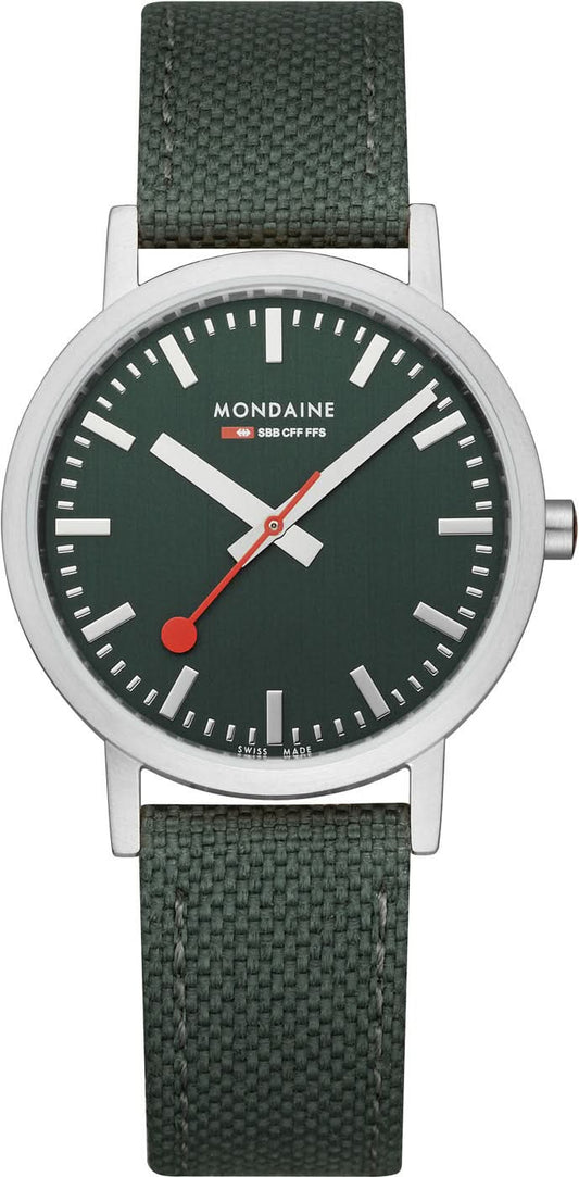 Unisex-armbandsur med mörkgrön urtavla, silverfärgat hölje och grönt textilband.