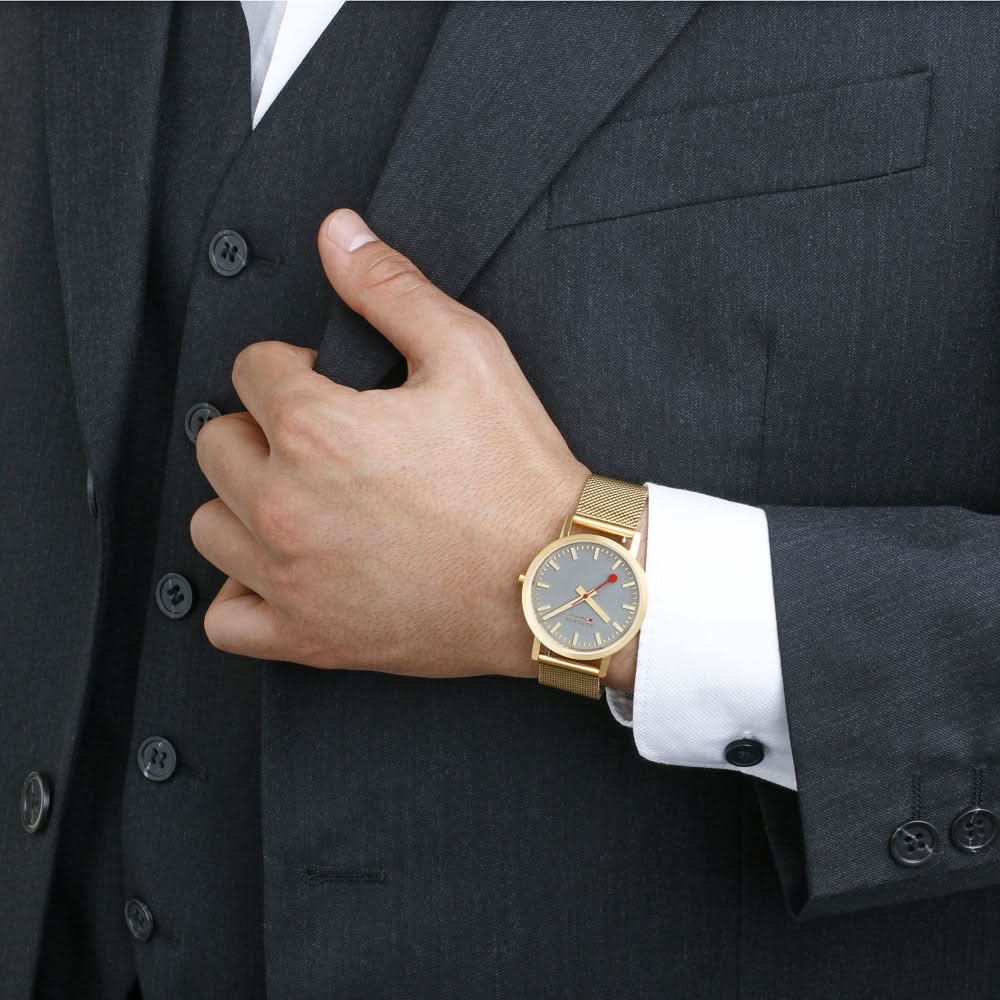 Unisexklocka med guldfärgat Milanese-armband och grå urtavla