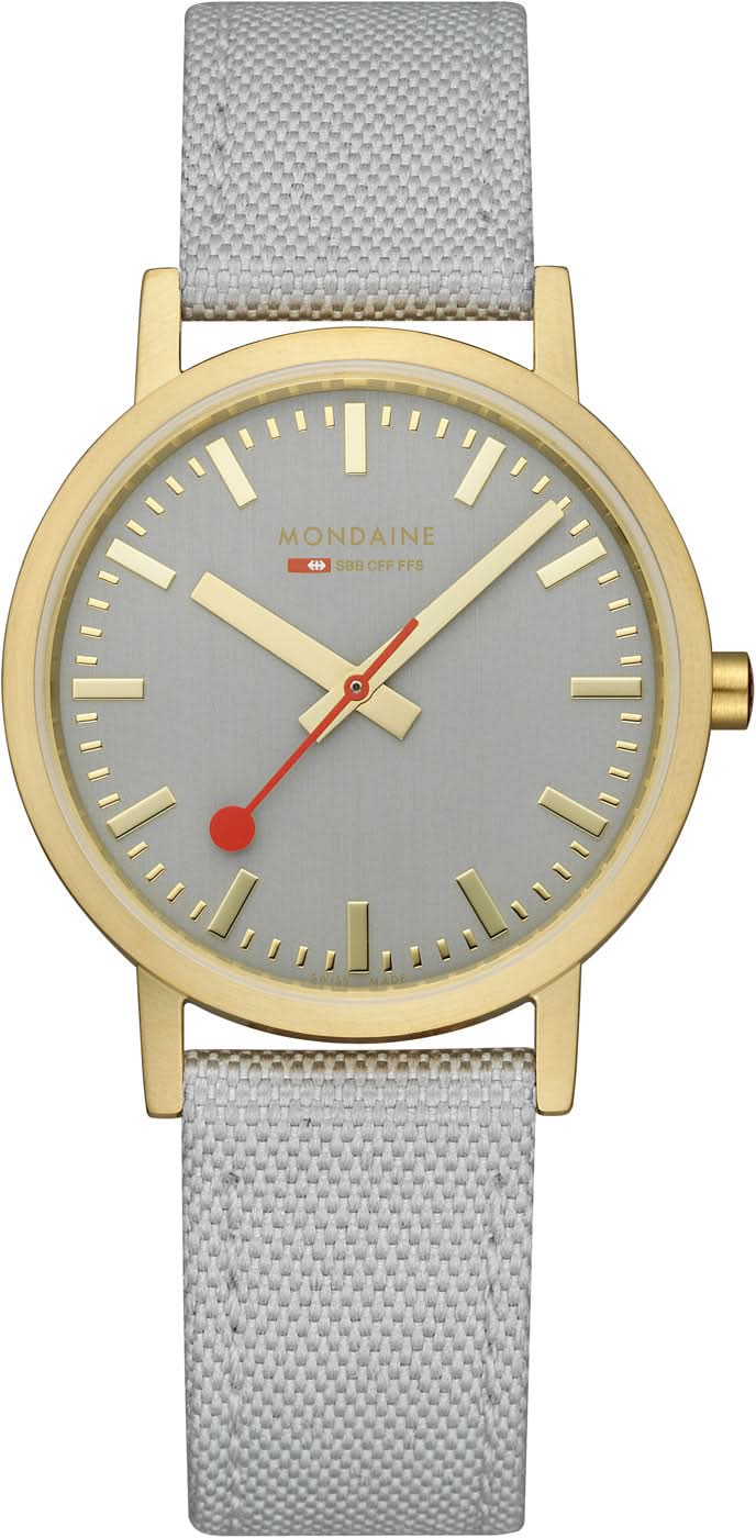 Mondaine Unisex-klocka med grått textilarmband, guldfärgad boett och grå urtavla